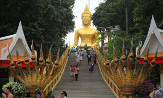 18 metres (59 ft) tall Big Buddha statue in the Wat Phra Yai temple (built in the 1940s), Phra Tamnak Hill