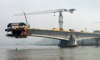 This concrete bridge temporarily functions as a set of two balanced cantilevers during construction