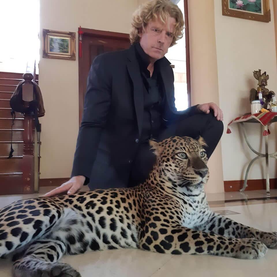 Mario Kleff in 2019 with his male leopard Typhoon.