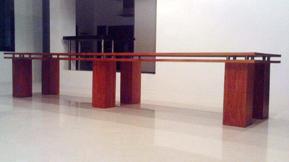 Elegant Wooden Table with Large Legs and Long Plate